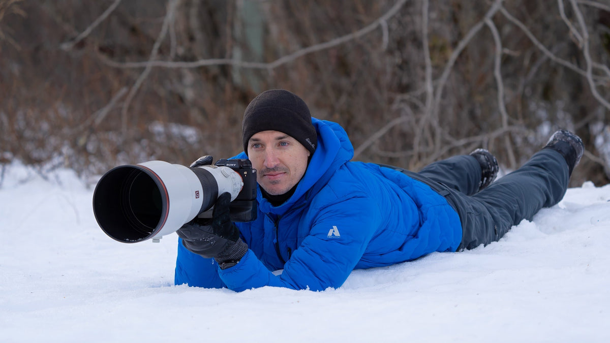 Vallerret Ambassador Colby Brown wearing the Hatchet Camera Glove shooting outdoors in the winter.